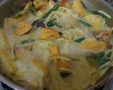 Foto langkah ke 4 dari resep Lodeh Rebung Tahu Kuning.