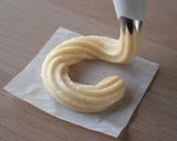 A picture of step 7 of French Cruller Donuts.
