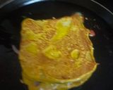 A picture of step 3 of Pudla Sandwich.