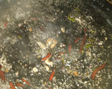 Foto del paso 2 de la receta: Arroz negro de calamares y langostinos