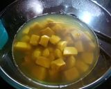 A picture of step 1 of Yam and Colacasia Curry.