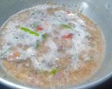 A picture of step 2 of Broken Wheat Upma.