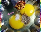 A picture of step 2 of Spicy Egg With Roti.