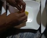 A picture of step 6 of Humitas (steamed fresh corn cakes).