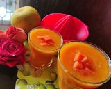 A picture of step 3 of Orange Papaya juice.