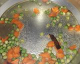 A picture of step 1 of Veg pulao with chicken gravy.