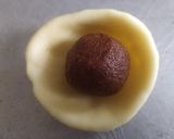 A picture of step 7 of Kharpudi Puri or Pudi stuffed with sweet fragrant besan.