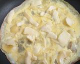 A picture of step 3 of Potato omelette Sandwich.