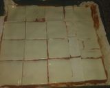 Foto del paso 5 de la receta: Pizza de atún, jamón york, queso rulo de cabra, bacon y cebolla