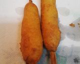 A picture of step 3 of Hand Dipped Corndogs.