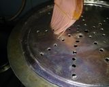 A picture of step 3 of Mu-bandi bariyan.