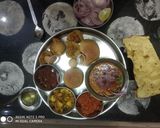 राजस्थानी स्टफ दाल -बाटी(बिना ओवन और बाटी कूकर के)साथ लहसुन चटनी रेसिपी चरण 14 फोटो