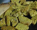 Parsley Lauki muthiya topped with pizza sezhwan sauce recipe step 5 photo