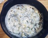 A picture of step 2 of Creamy Cucumber Salad.