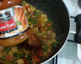 A picture of step 3 of Tom yum shrimp rice.