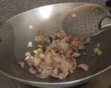 A picture of step 2 of Sev tamatar nu saag.