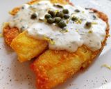 Foto del paso 7 de la receta: Tilapia rebozada en cúrcuma con salsa de alcaparras