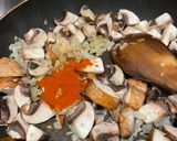 A picture of step 2 of Chicken and mushroom baked rice.