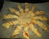 Foto del paso 9 de la receta Estrella de hojaldre con bacon y queso