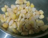 A picture of step 1 of Masala Corn Rice.