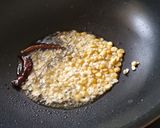 A picture of step 6 of Lemon Rice With Masala curd.