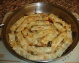 Foto del paso 11 de la receta Lonchas de pollo, champiñones y salsa de bechamel
