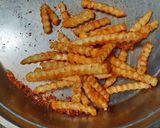 A picture of step 5 of Peri peri fries.