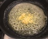Foto del paso 2 de la receta: Ostiones al pil pil con vino blanco