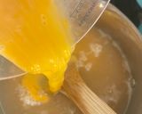 A picture of step 3 of Rice porridge with crab stock.