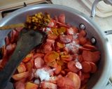 A picture of step 9 of Carrots and Tomato Bujeya.