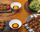 A picture of step 11 of Tsukune No Teriyaki - Chicken meatballs with teriyaki sauce.