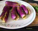 A picture of step 6 of Andhra Style Gutti Vankaya Pulusu Koora /Stuffed Brinjal Gravy Curry.