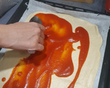 Foto del paso 2 de la receta: Pizza de cherries, mozzarella, bacon y olivas