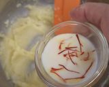 A picture of step 2 of Eggless mawa cup cake topping with shrikhand.