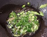 A picture of step 3 of Satvik dates pickle(no garlic)My style.