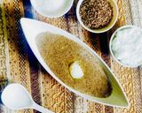 A picture of step 4 of Rajasthani Bajra Khichda (pearl millet).