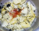 A picture of step 3 of Khatti Meethi Kairi ki chutney.