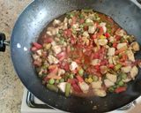A picture of step 13 of Schezwan Fried Rice.