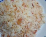 Foto del paso 4 de la receta: Arroz entomatado con cebolla