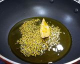 A picture of step 1 of Lasooni Aloo Methi.