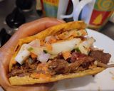 Foto del paso 14 de la receta: Arepa🥯rellena de pollo🫕y salchichón teriyaky con ensalada fresca🥙🧆🌯