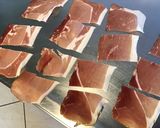 A picture of step 3 of Appetizer Skewers with Green Olives, Tomato, Prosciutto, and Pyrenees Cheese.