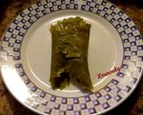A picture of step 4 of Traditional Stuffed Grape Leaves (Dolmadakia).