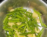 A picture of step 1 of Guvar batata.