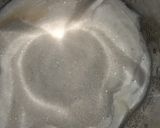 A picture of step 2 of Mango milk shake.