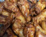 Foto del paso 4 de la receta: Alitas y muslos de pollo en salsa BBQ