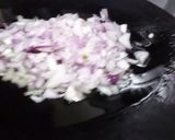 A picture of step 1 of Aloo ka bharta.