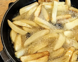 Foto del paso 7 de la receta: Muslos de pollo estofados con almendras, arándanos y pasas