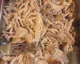 A picture of step 8 of Slow cooker ginger beer pulled pork.