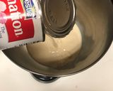 A picture of step 2 of Puerto Rican Style Flan.